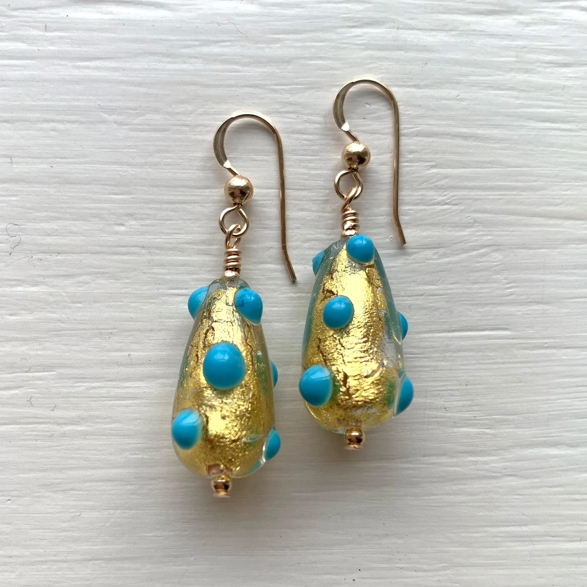 Earrings with turquoise (blue) spots over gold Murano glass short pear drops on silver or gold