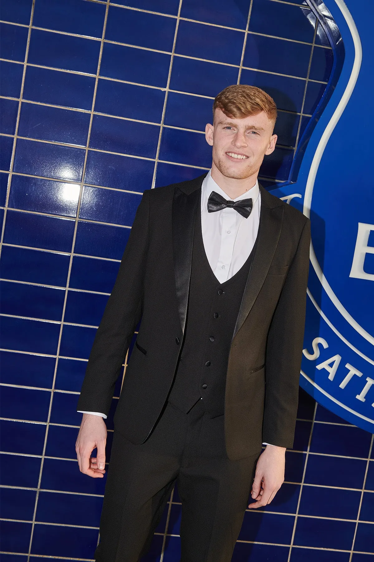 The Everton Collection | Jarrad Branthwaite in DALTON Black Tux Lapel Diamond Suit